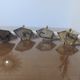 Series of 4 art deco sconces to lions in solid golden brass 40s 50s