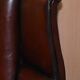 Victorian leather canapé and armchair, barrel back, circa 1860, restored.
