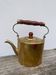 Teapot in gilded brass and wood
