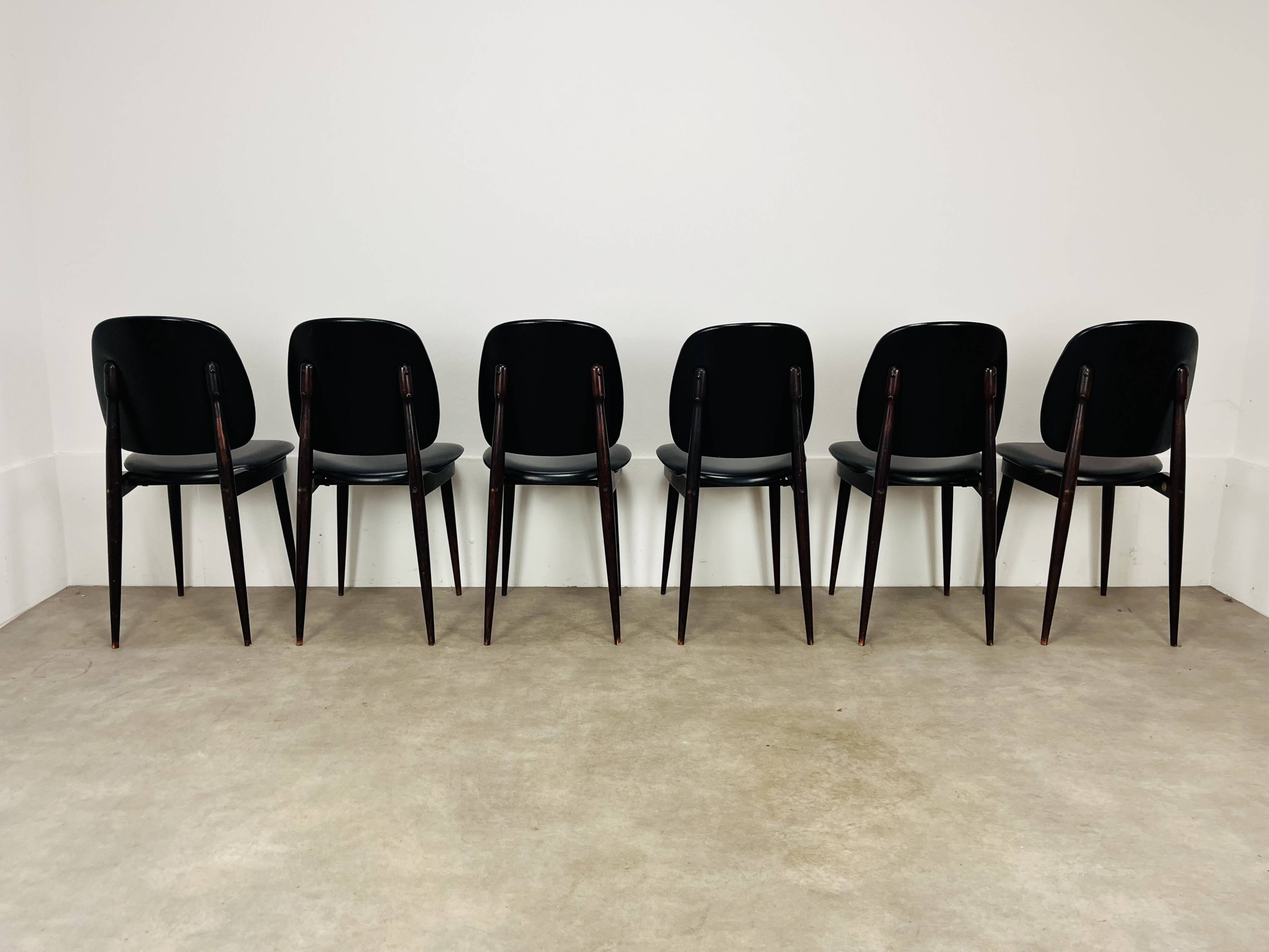 6 Pégase Baumann chairs, black, 1960s