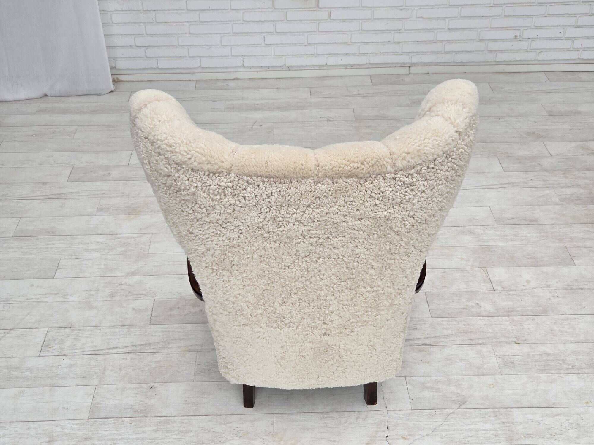 1960s, Danish high-back armchair, genuine sheepskin, reupholstered.