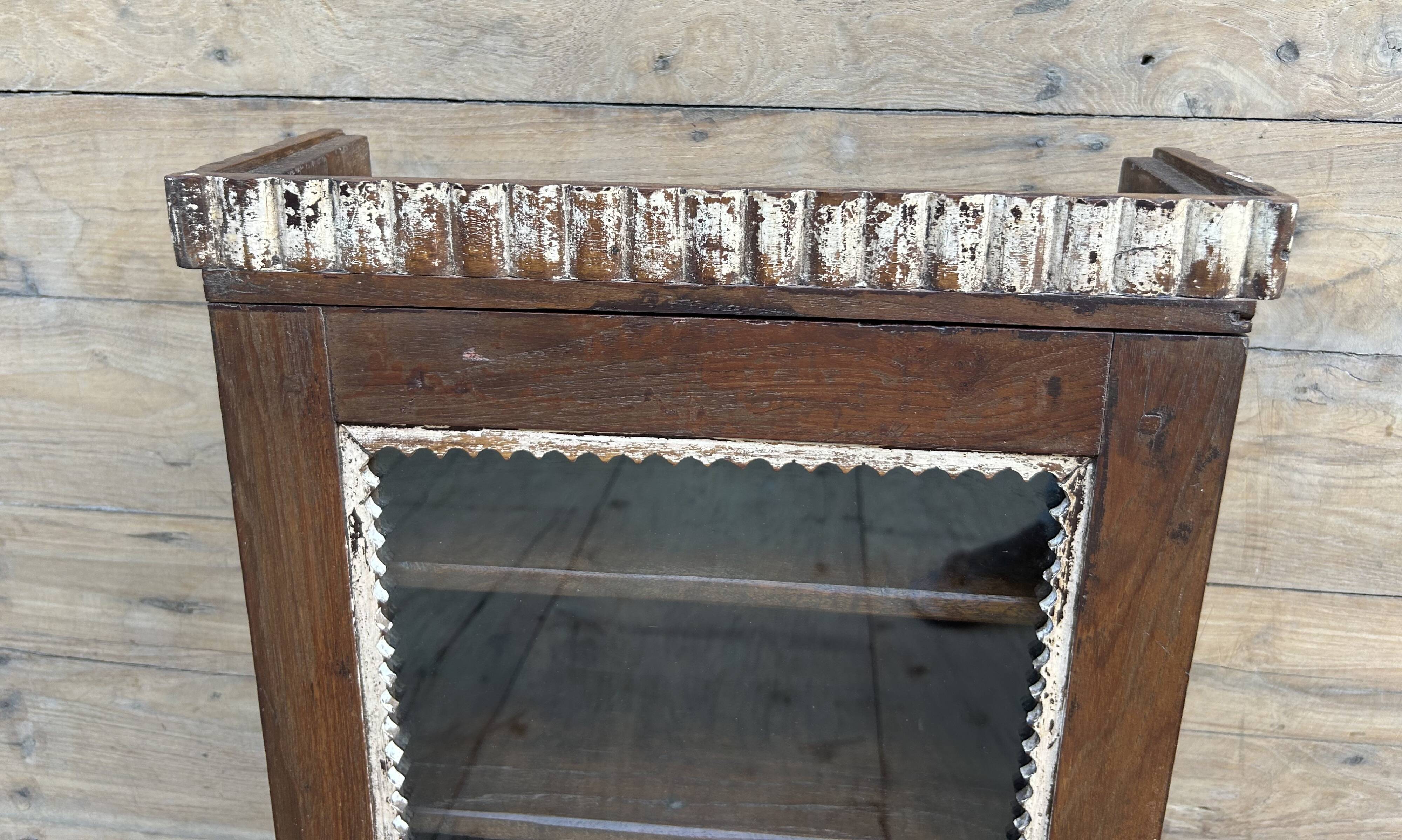 Art Deco wall display cabinet in Burmese teak with original patina.