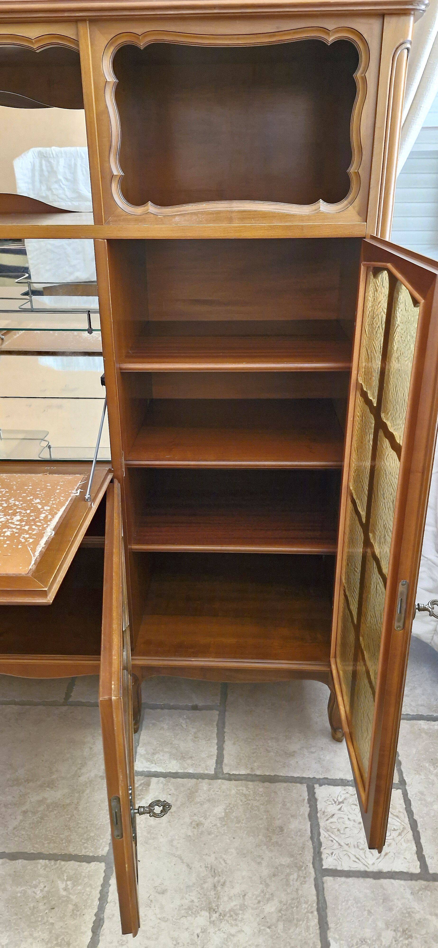 Wooden sideboard with 5 doors and 3 drawers, 2 glass doors.