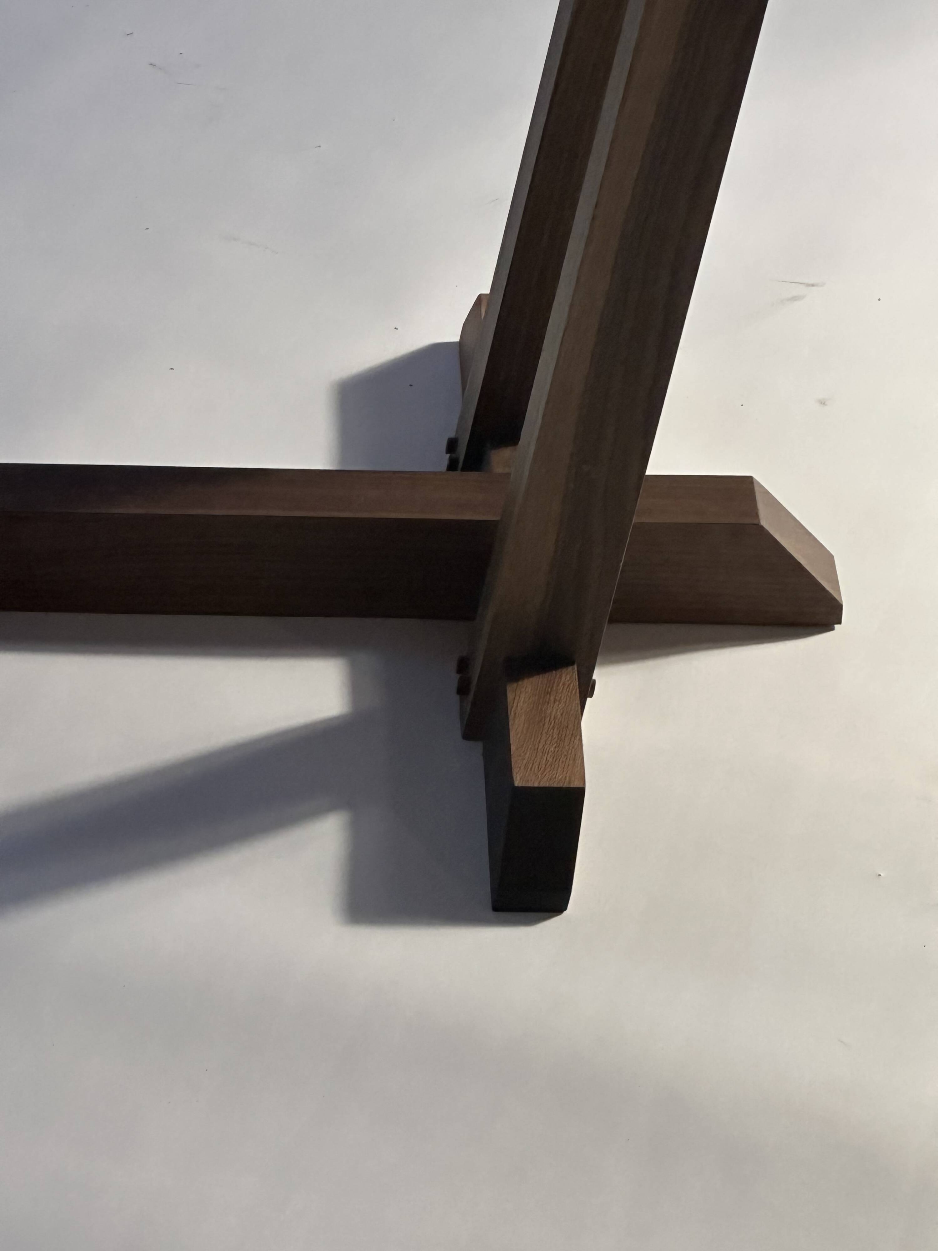 Exceptional dining table in solid walnut.