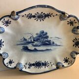 Old dish mounted in ceramic, scallop