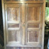 Front of old double door walnut cabinet
