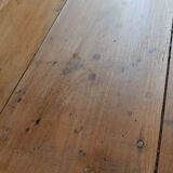 Coffee table with raw wood and a large drawer.