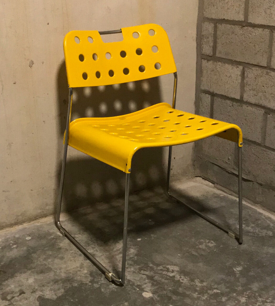 Set of 4 yellow Omstak chairs, Rodney Kinsman