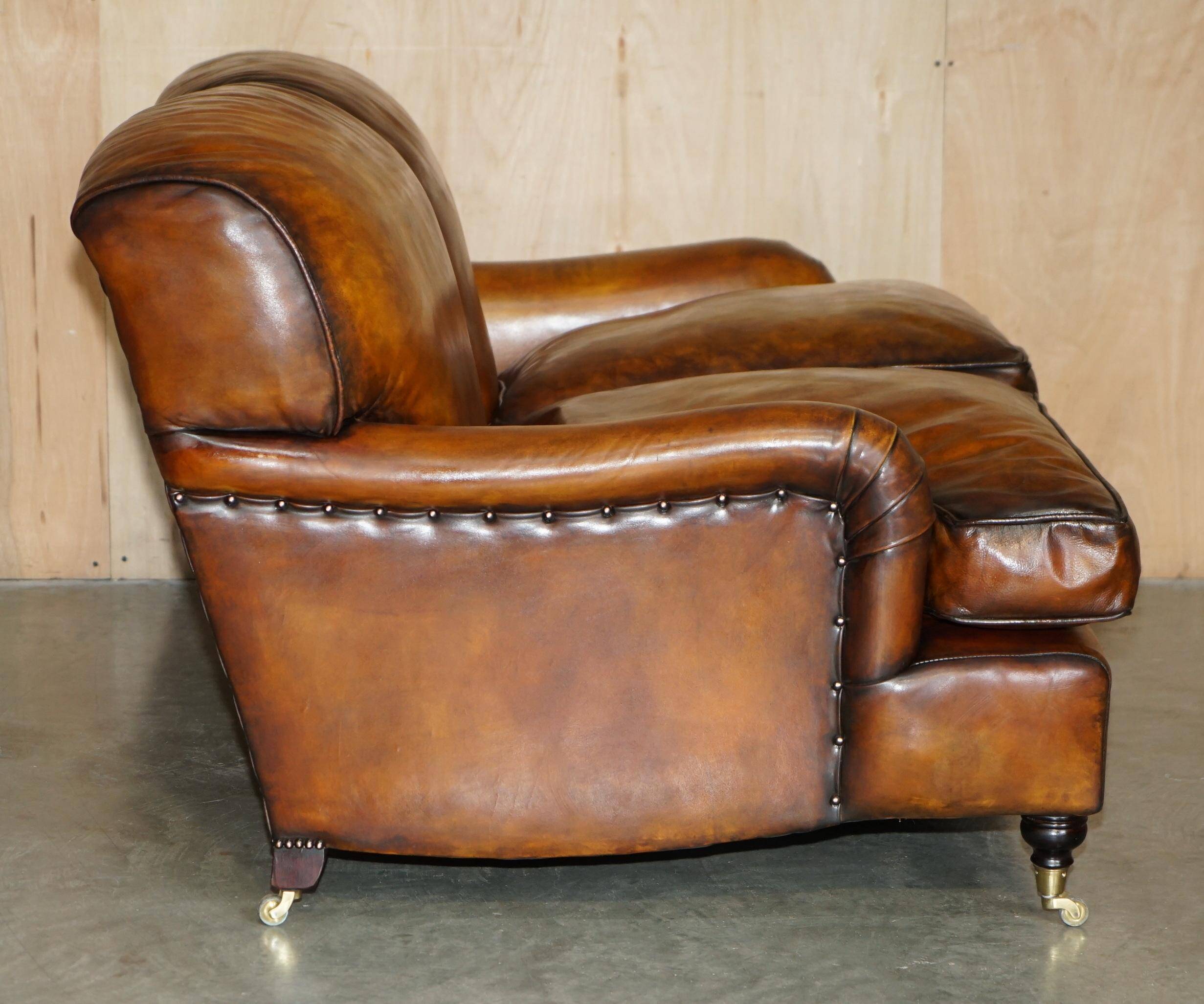Howard & Son restored leather canapé, width 145 cm