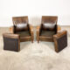 Set of two vintage leather wagon wheel armchairs Haarle