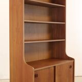 vintage bookcase with full on storage space.