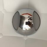 Shiny chrome dressing room light