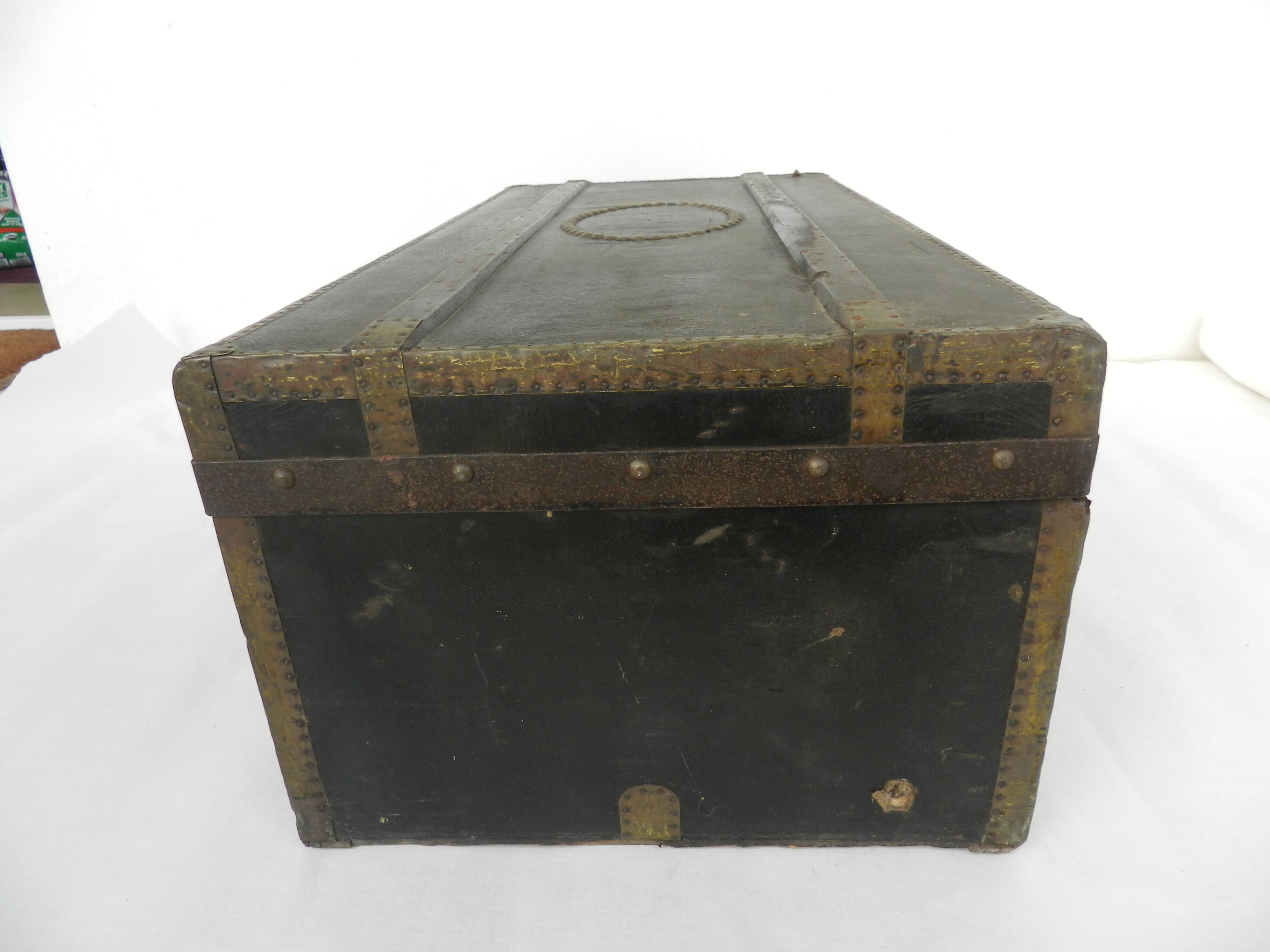 Old wooden, iron and brass trunk