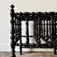 Napoleon III magazine rack in black turned wood