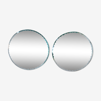 Pair of round beveled mirrors to be installed