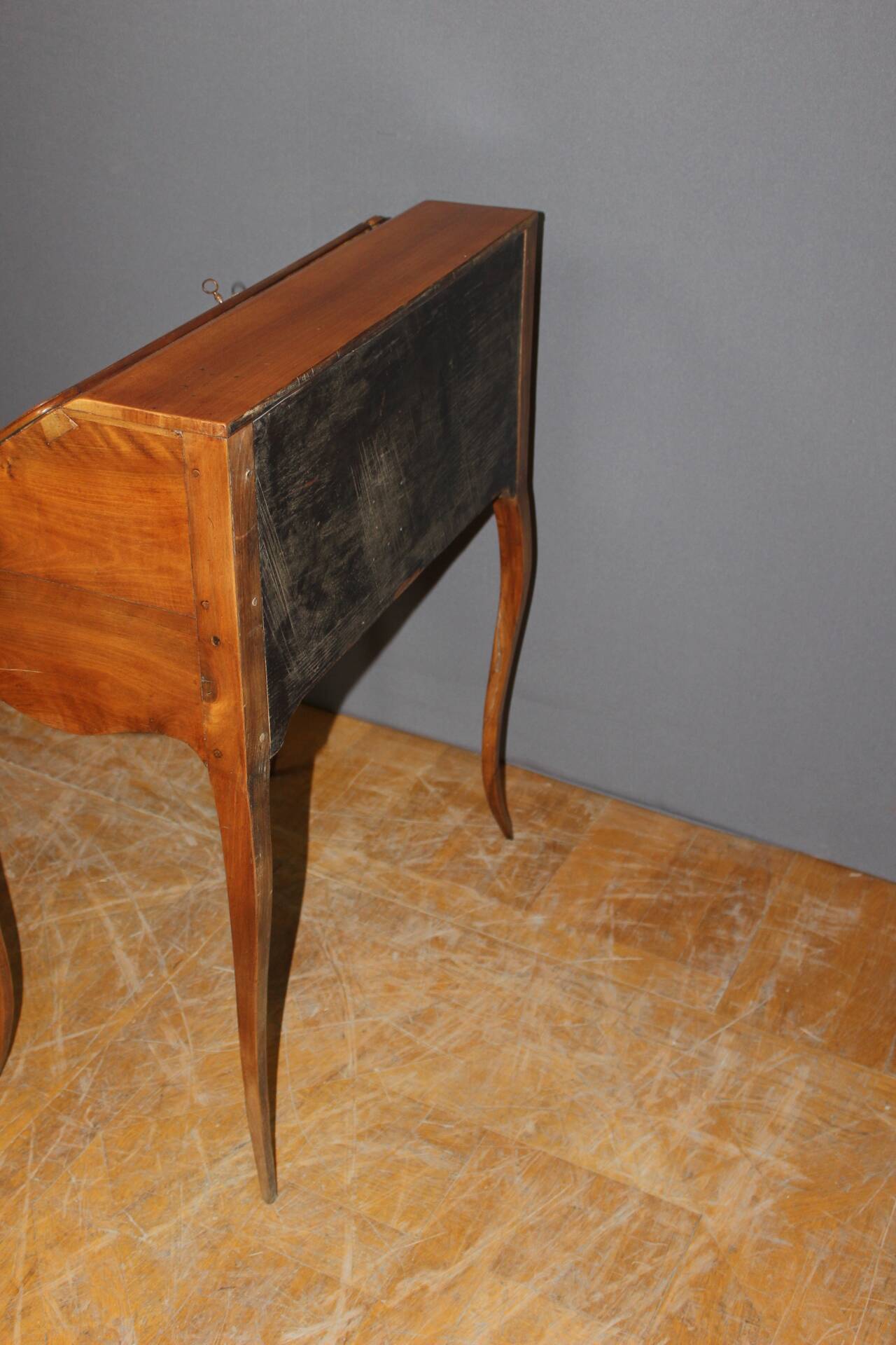 Louis XV donkey back desk in 18th century walnut