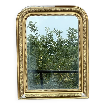 Miroir Louis Philippe en bois doré à frise ajourée glace au mercure