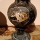 Pair of black serpentine marble vase-urns, early 20th century, Empire style