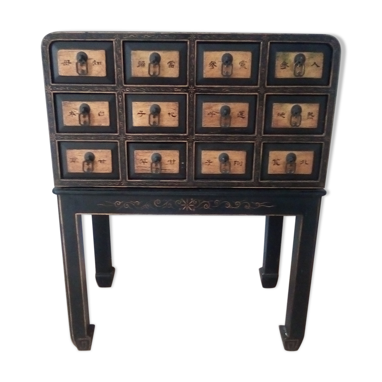 Furniture with an ancient Asian apothecary drawer