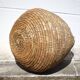 Old basket, burgundy straw and bramble, woven basket, interior decoration, pantry, flowerpot