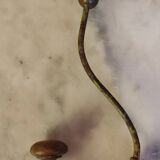 2 mismatched steel and wood coat hooks
