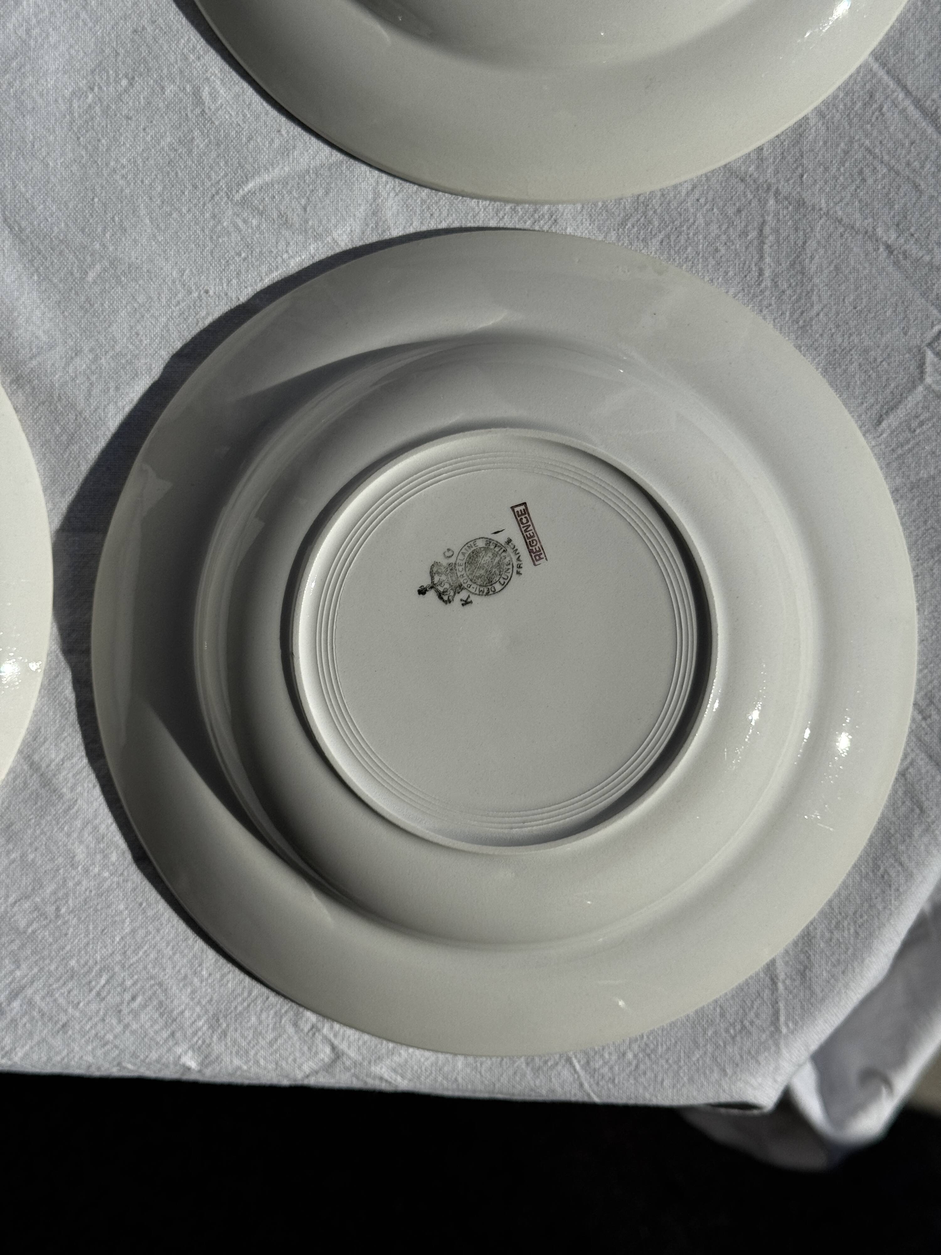 Set of 8 antique turquoise deep plates with a gold rim D22.5