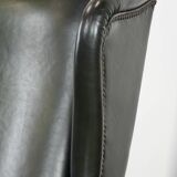 Smooth classic cowhide Chesterfield armchair in a stylish dark green color