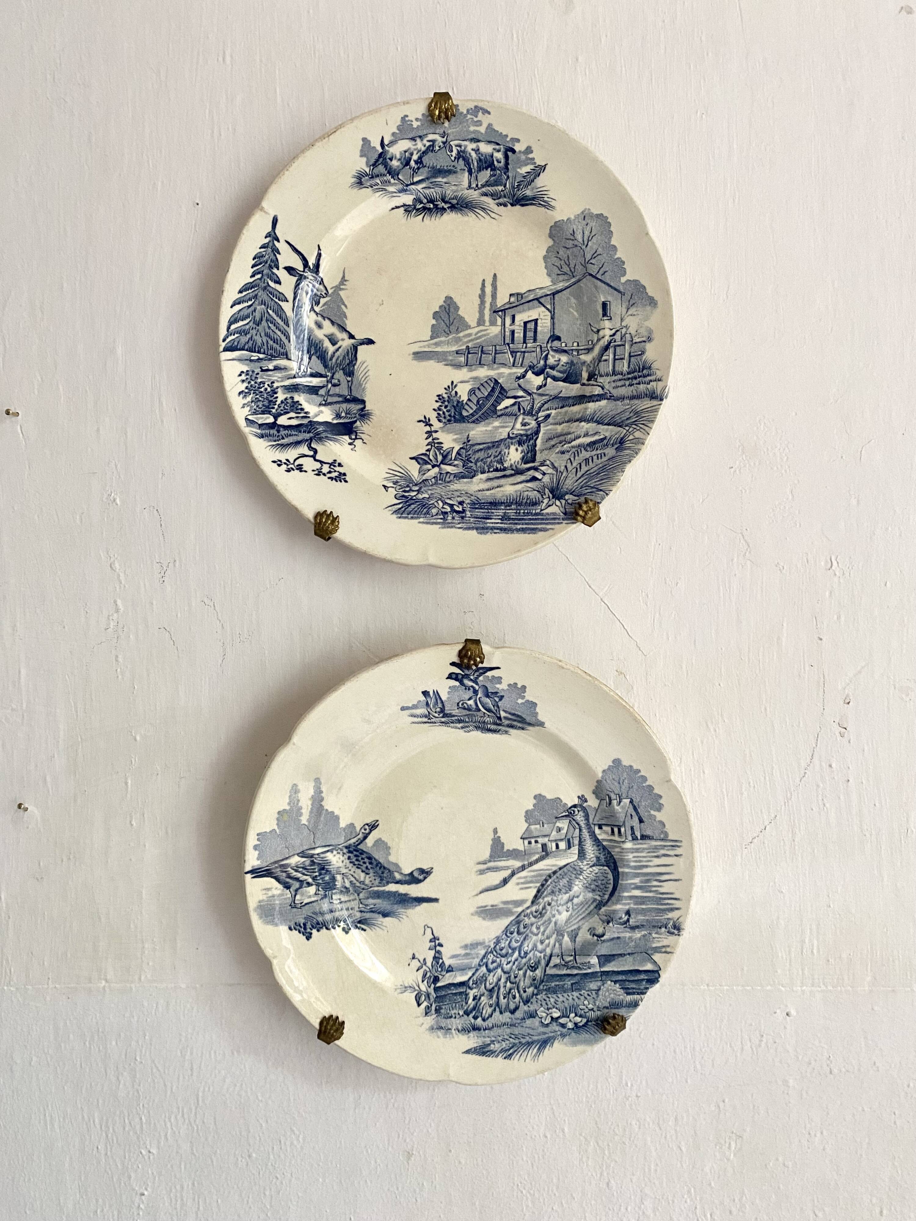 "Rustic" iron earth plate with goats