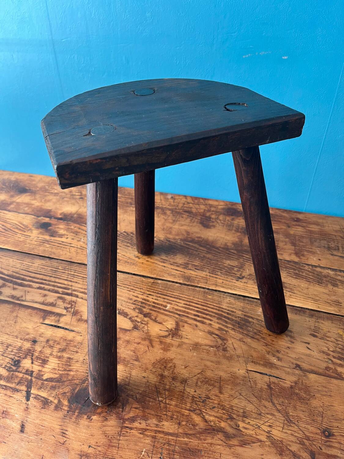 Wooden milking tripod stool