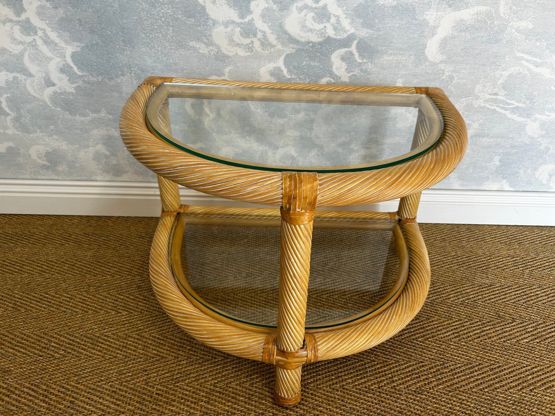 Two-tiered twisted rattan accent table with glass shelves, 1970s