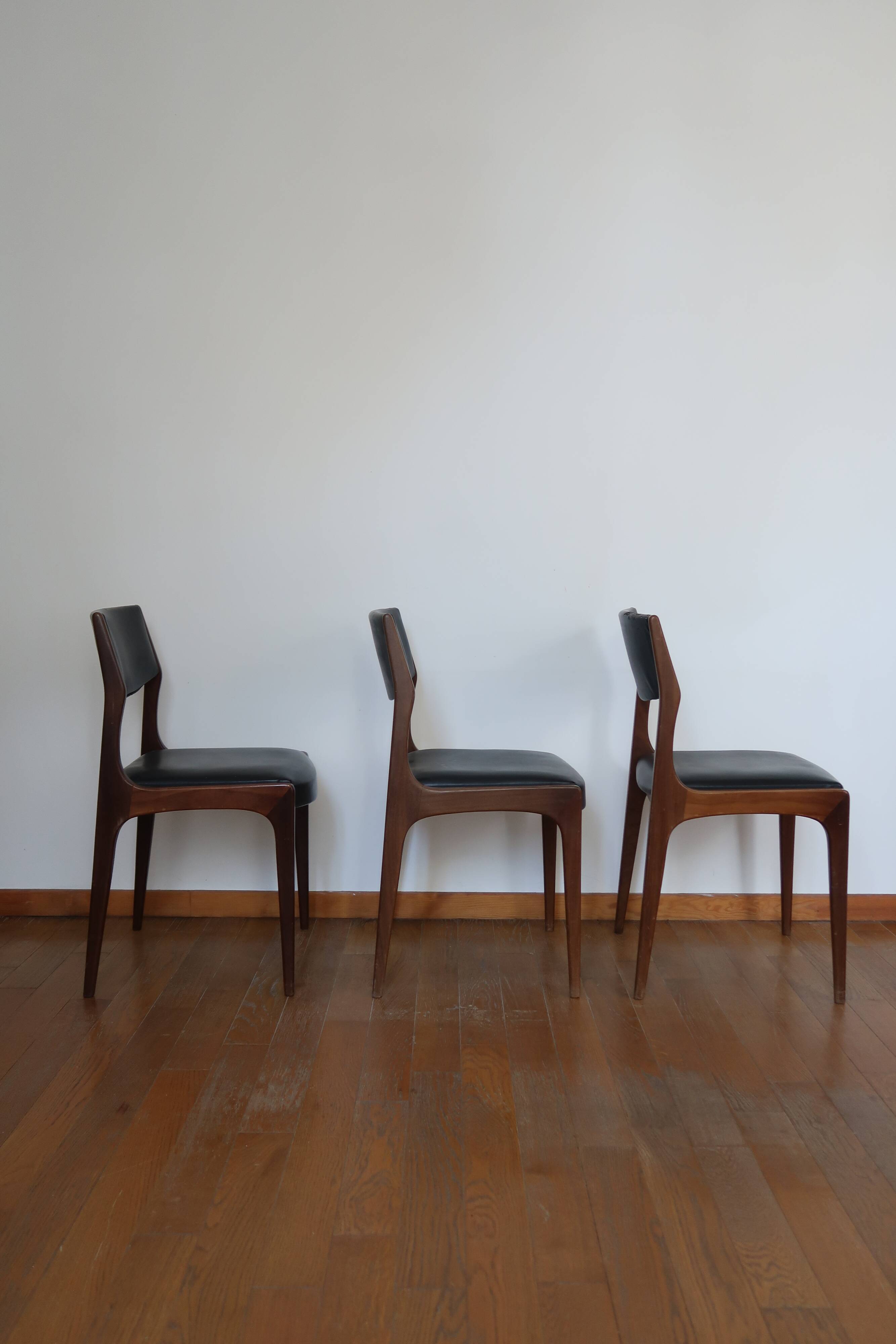 Series of 3 Scandinavian teak and skai chairs