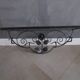 Art Deco wall-mounted coat rack/shelf in wrought iron