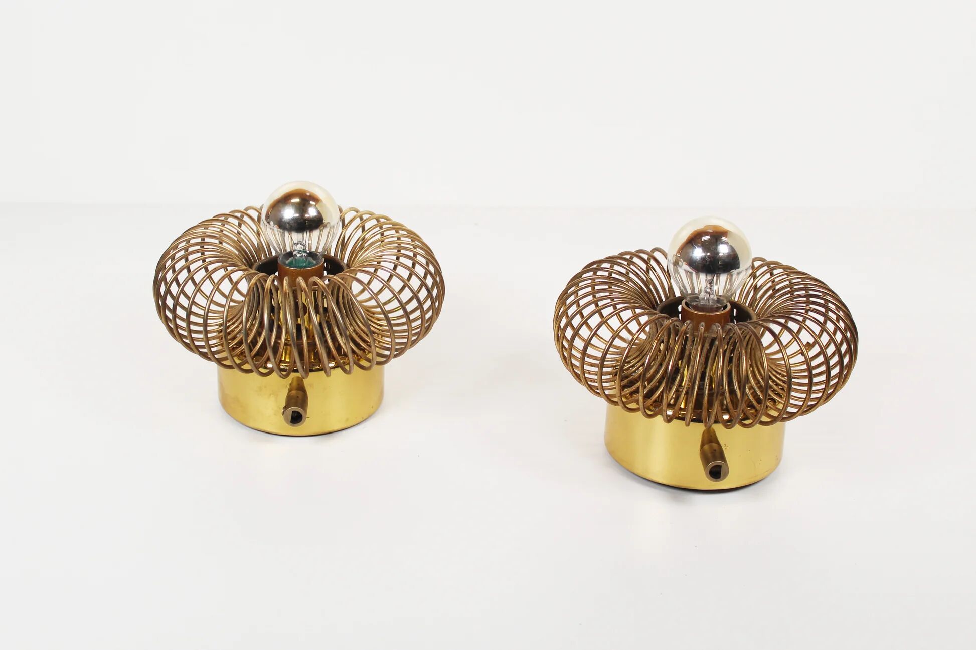 Pair of rare brass 'Spring' wall lamps by Oxar