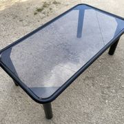 Vintage black tubular coffee table with smoked glass by Yves Boutboul, 1980.