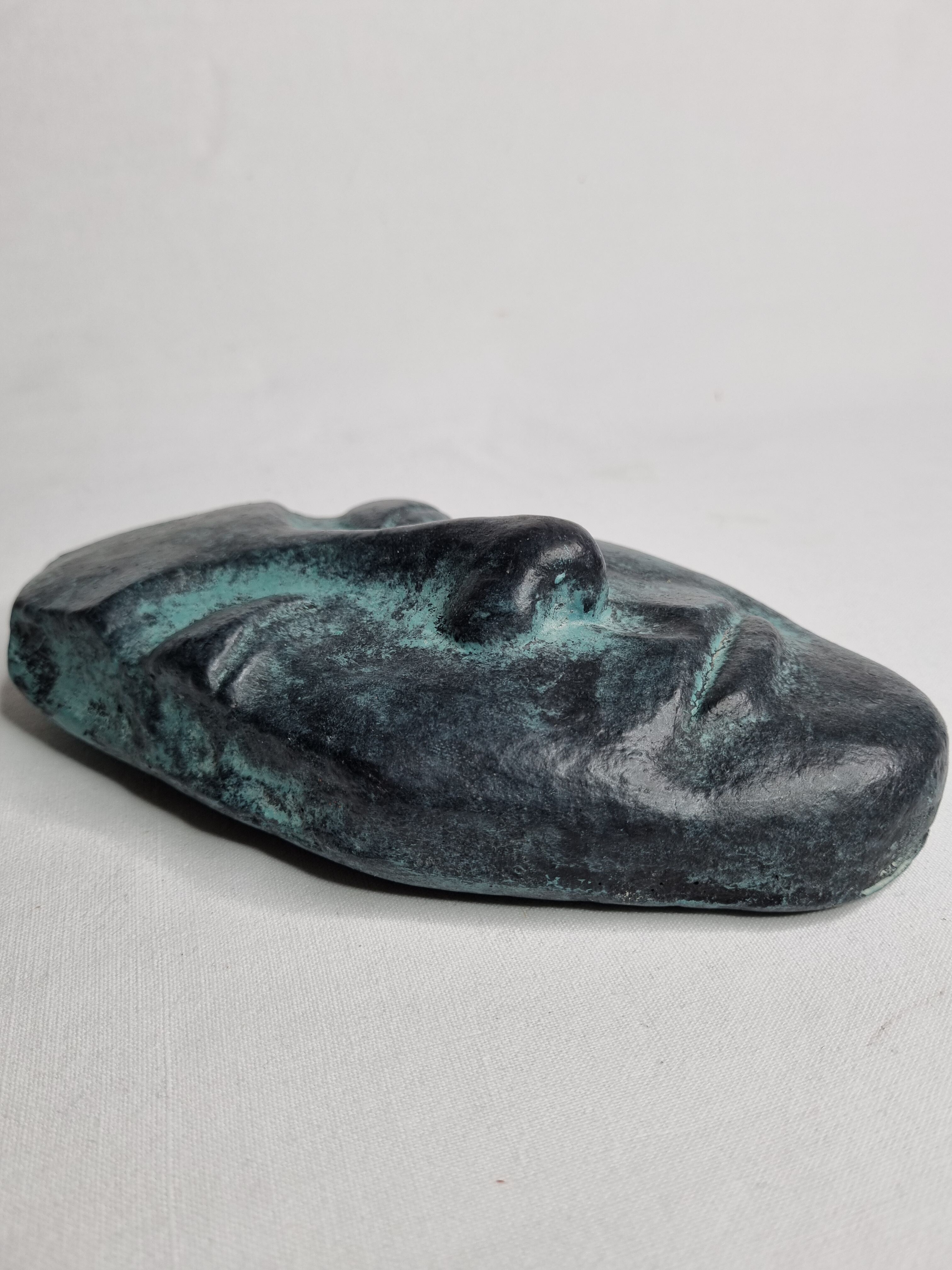 Patinated plaster replica of an ancient Greek face, signed