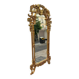 Miroir doré en bois
