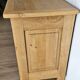Buffet / TV unit in solid oak with a caned door.