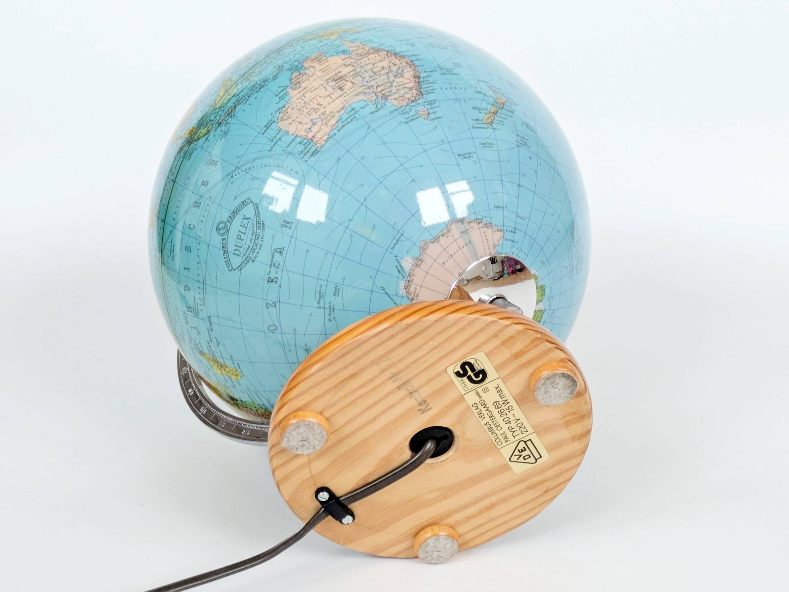 Columbus Duplex illuminated globe on a wooden base, 1980s