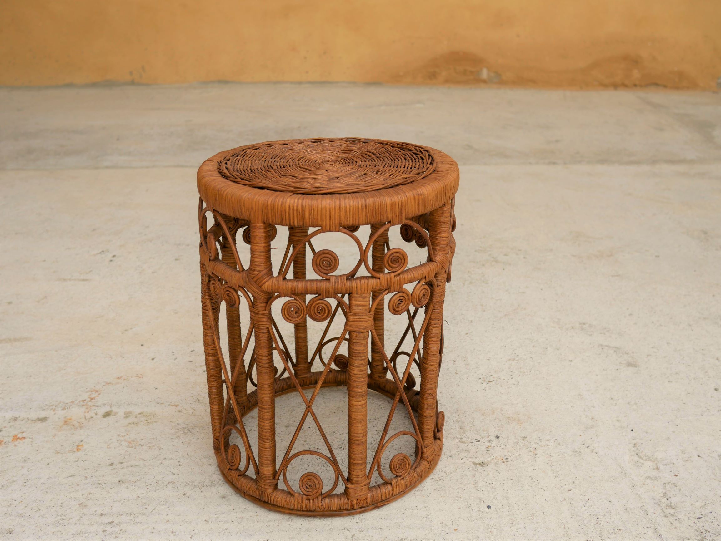Vintage peacock stool in rattan