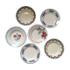 Six soup plates don't match in red and blue