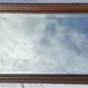 Grand miroir ancien biseauté cadre en bois sculpté