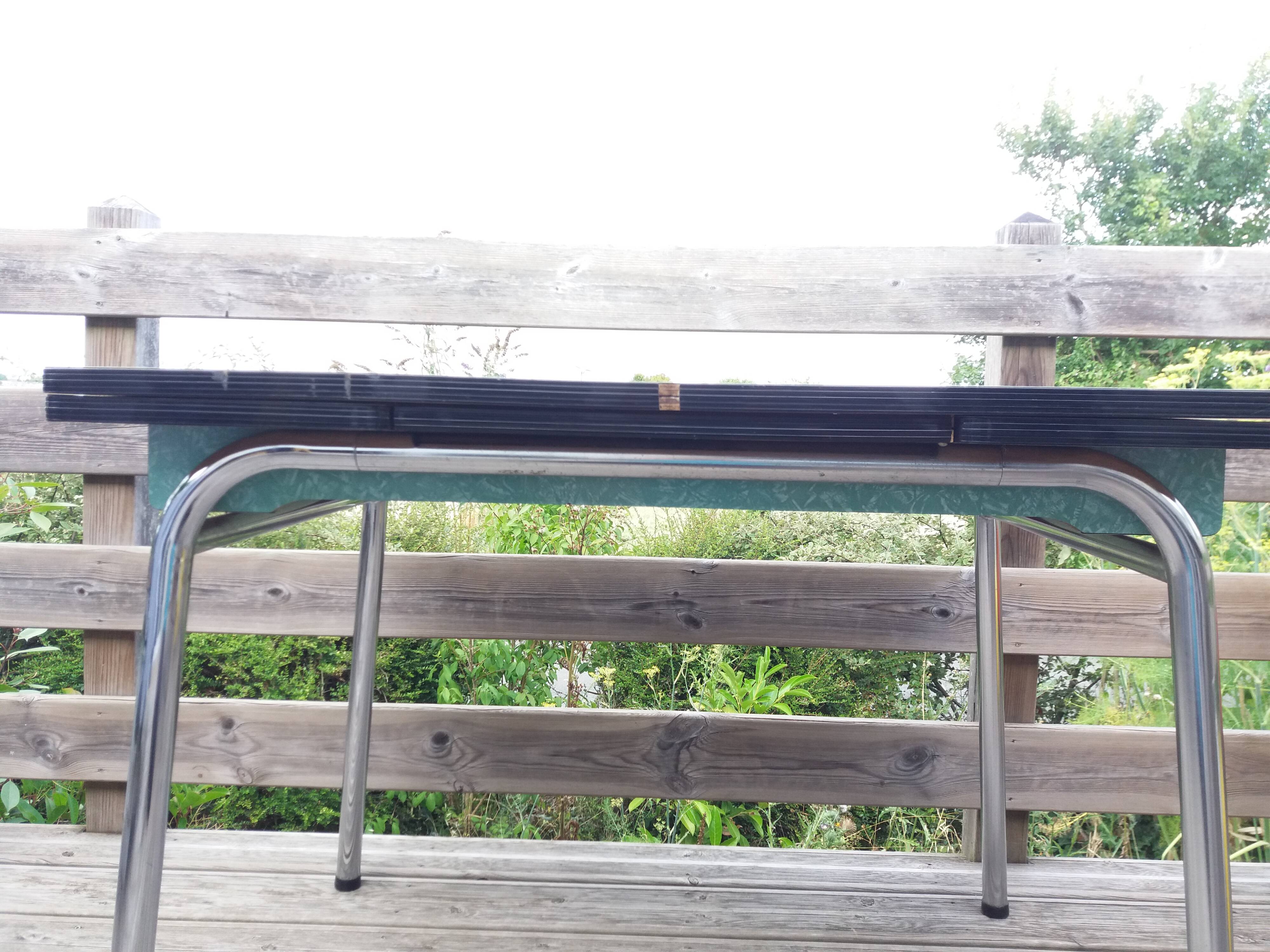 Formica and chrome-plated metal table