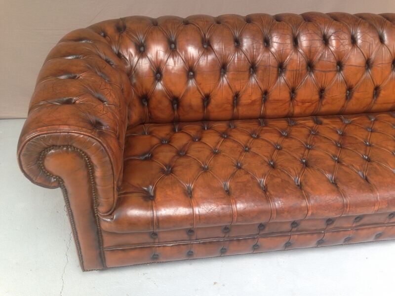 Upholstered chesterfield brown sofa