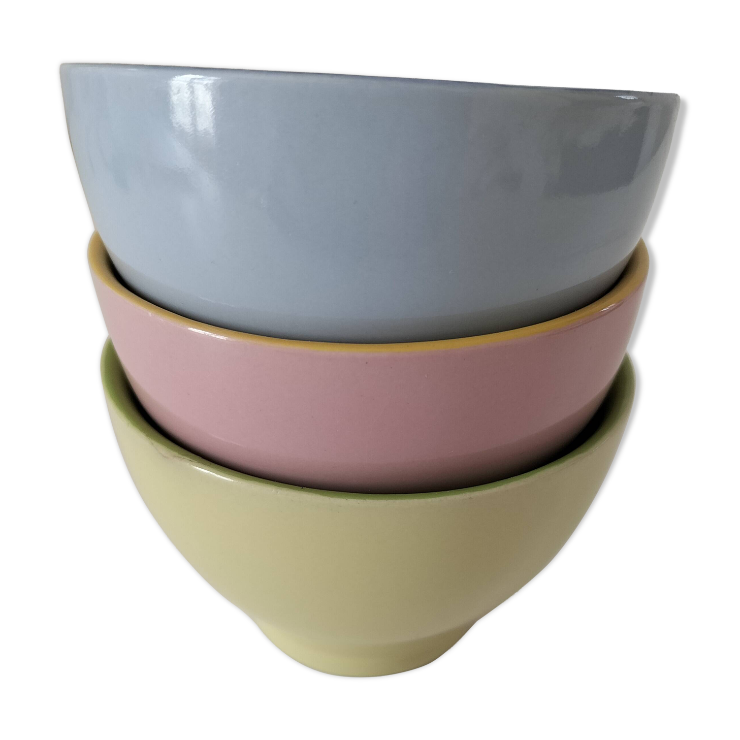 Set of three pastel two-tone mini bowls in glazed ceramic.