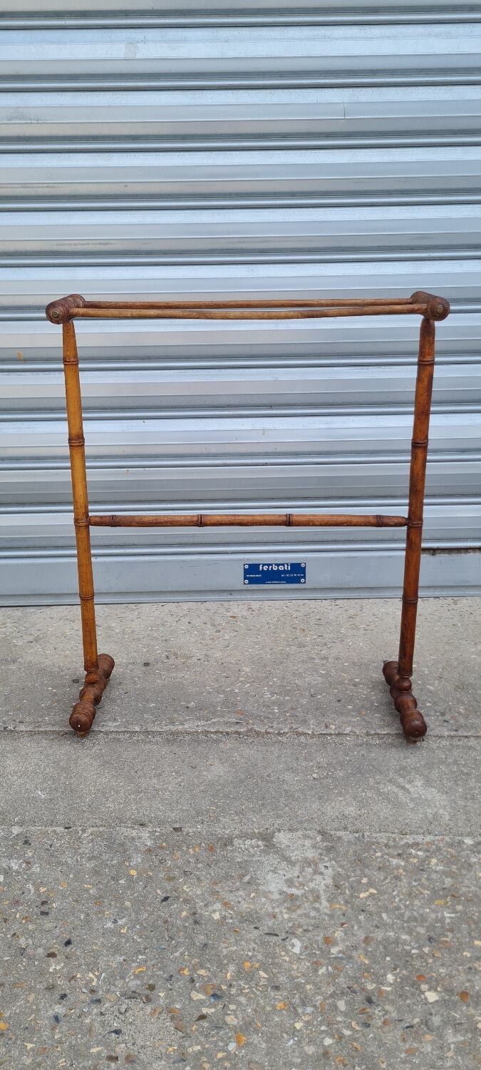 Turned wooden towel rack