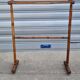 Turned wooden towel rack
