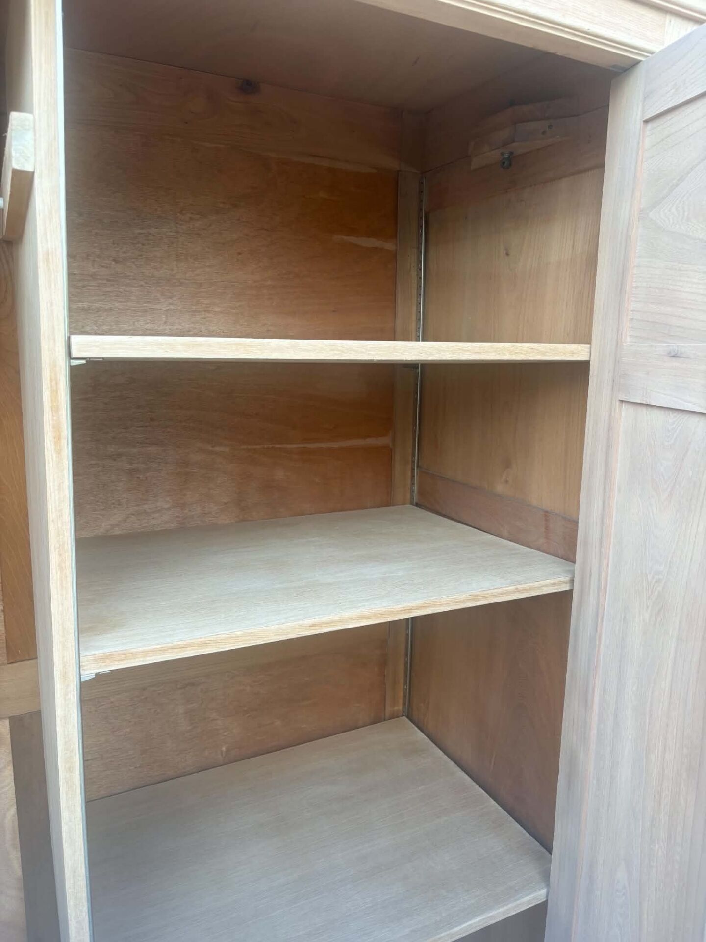 Large antique wardrobe in raw wood