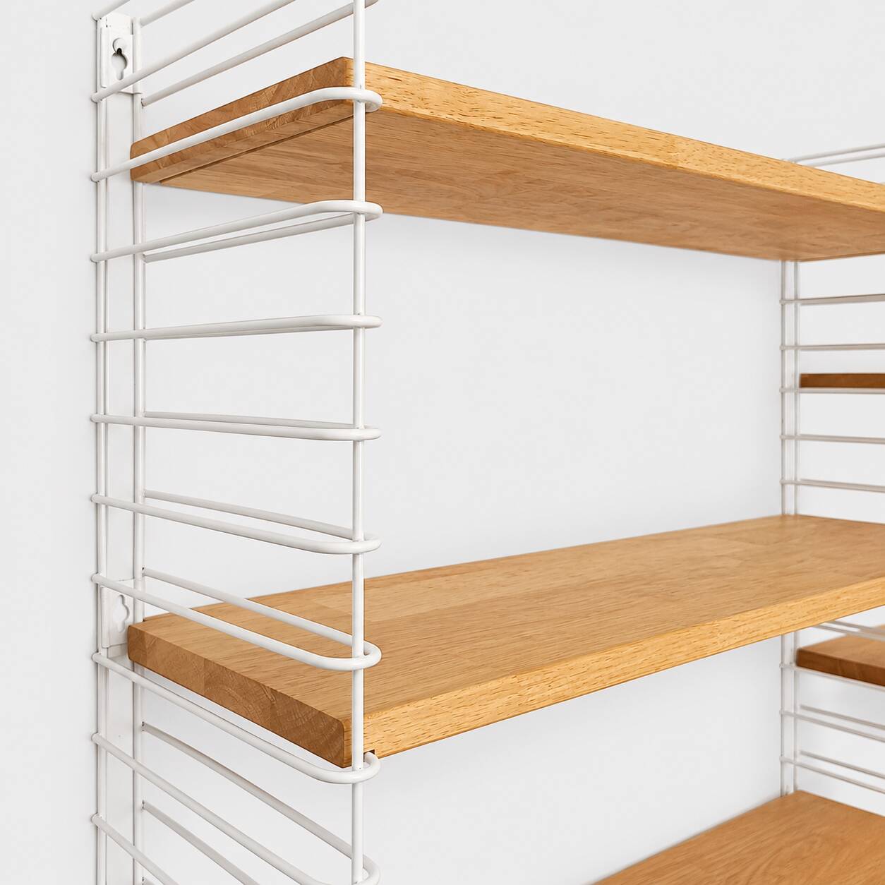 Tomado wall unit with wooden shelves by A. Dekker