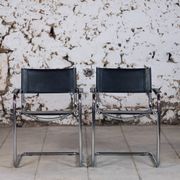 Pair of Bauhaus cantilever armchairs in chromed metal and leather, 1970