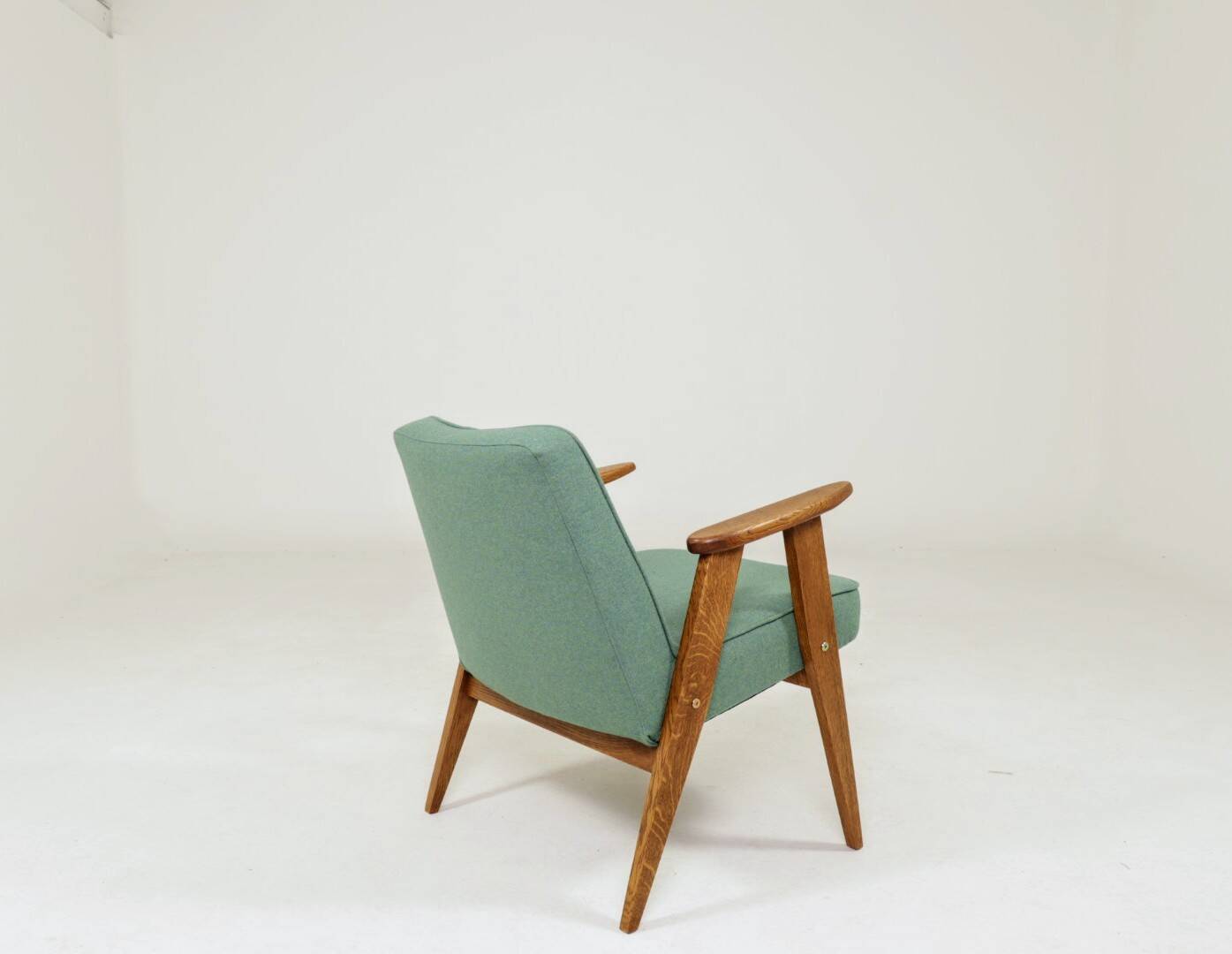 Fauteuil vintage en laine verte et bois de chêne